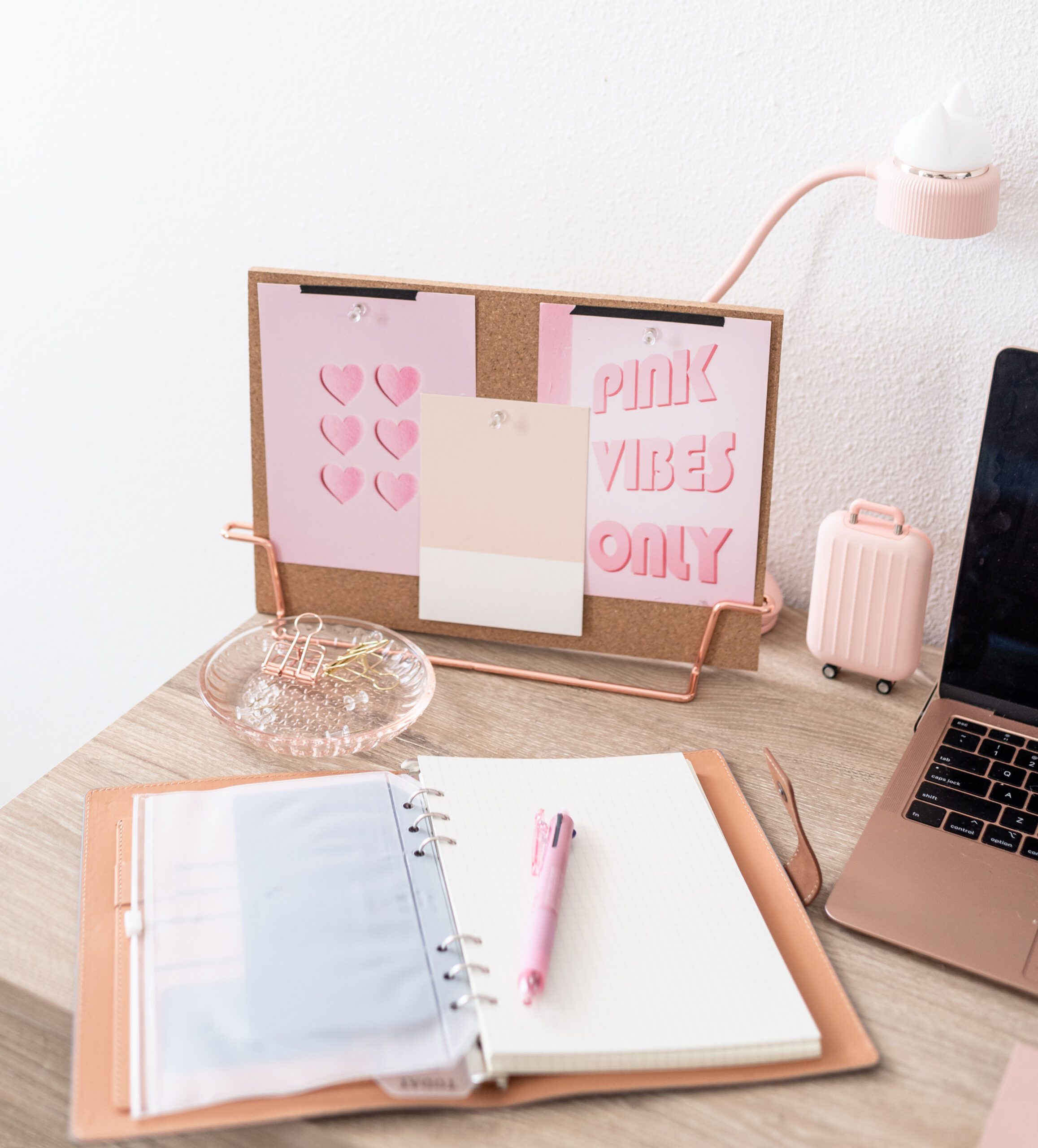 image of notebook on desk with pen, inviting user to create content