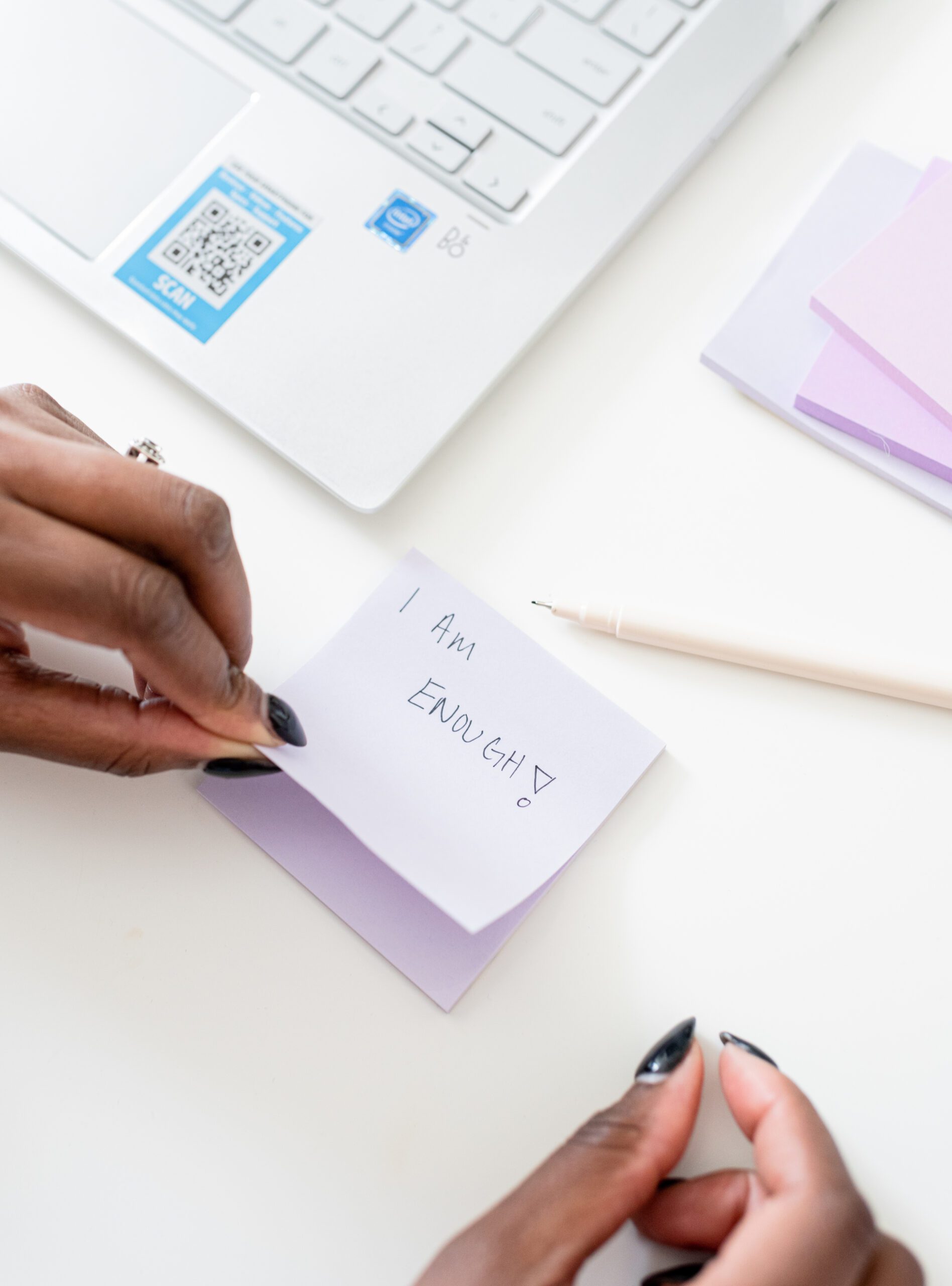 image of post it note that says I am enough. Black female business owner setting boundaries